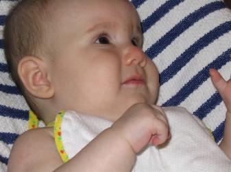 Audrey wasn't so sure about her first bite.  After a couple, she got used to the idea, and even cried when we stopped feeding her. 