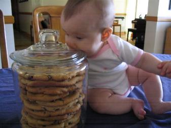 Daddy made some big cookies for the missionaries, but we had to put Audrey next to them to get some perspective as to just how big they were.  She tried to eat them.  Not yet, baby, not yet.
