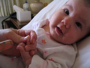 Getting a manicure in preparation for her baby blessing...  Hope she doesn't get used to this kind of treatment!