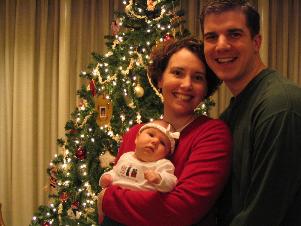 Little photo shoot in front of the Christmas tree.  Audrey wasn't too happy. This is the cas shot.