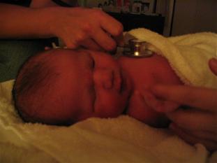 First check-up, which she passed with flying colors, She also scored a ten on the Apgar!