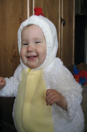 Looking happy looking like a chicken.