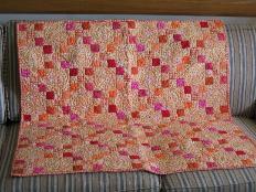This is the quilt that Laura made for Audrey.  Rather, this is the quilt that Laura pieced for Audrey.  Someone else quilted it.