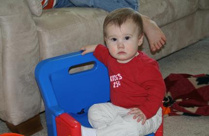 Audrey in her chair.  She loves this chair, and wo be unto the little kid who comes over and tries to sit in it.