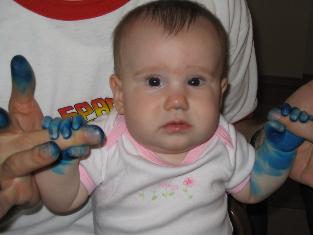 Audrey was not happy about turning her hands blue. I think this picture is so funny, just her look of, 